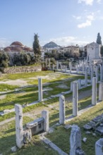 Columns of the Roman Agora of Athens, Tower of the Winds at the back, Athens, Attica, Greece,