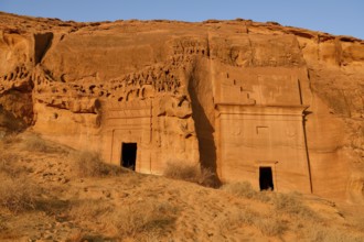 Nabataean tombs at Djabal Al-Ahmar in first daylight, Hegra or Madain Salih, AlUla region, Medina