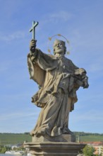 Statue of Saint John Nepomuk, sculpture, cross, halo, gesture, high, hold, Old Main Bridge,