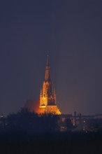 Illuminated cathedral in the Hanseatic town of Demmin on the River Peene, Peene Valley River