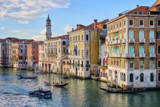 VENICE, ITALY, JUNE 27, 2018: Grand Canal with boats and gondolas on sunset, Venice, Italy, Europe