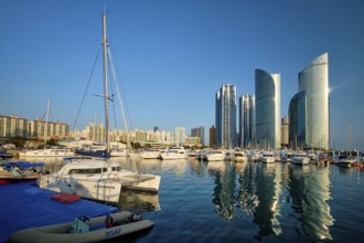 BUSAN, SOUTH KOREA, APRIL 11, 2017: Busan marina with yachts, Marina city skyscrapers with