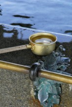 Ladle at well, Higashi Hongan-ji temple, Kyoto, Japan, Asia