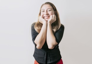 Cheerful and friendly girl face looking and smiling at the camera. Portrait of friendly latin girl