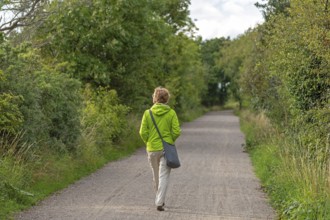 Woman walking, Geltinger Birk, Schleswig-Holstein, Germany, Europe