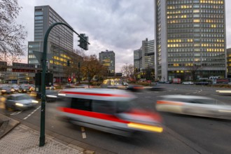 Evening city centre traffic in Essen, large intersection, Bismarck Platz, Hindenburg Strasse, Krupp