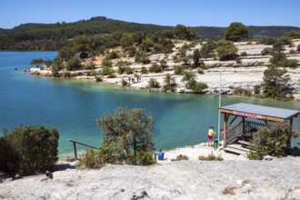 Bathing spot on the rocky beach at Lac d Esparron, Esparron-de-Verdon, Provence-Alpes-Côte d'Azur,