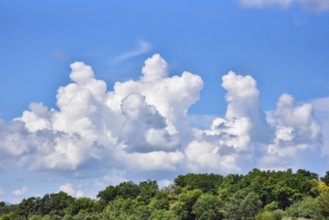 A thunderstorm front with (cumulus) and cumulo nimbus clouds, Bavaria, Germany, Europe