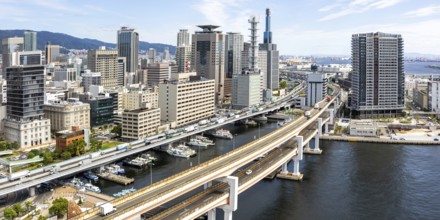 Kobe skyline from above with harbour and elevated road panorama in Kobe, Japan, Asia