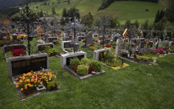 Cemetery with metal crosses, St. George Catholic Parish Church, Neustift, Stubai Valley, Tyrol,