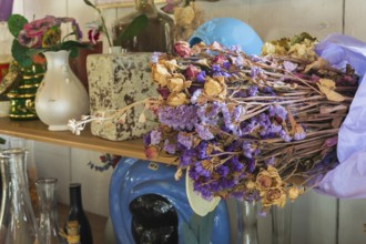 Dried flowers and curios for sale inside second hand goods and chattels store, Quebec, Canada,