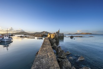 Ruins of the Venetian castle of Naoussa at sunset, Naoussa, Paros, Cyclades, Greece, Europe