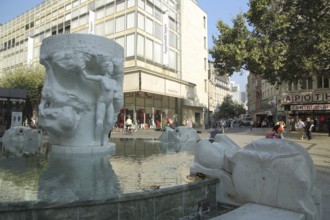 Brockhaus fountain with figure in the pedestrian zone, Brockhaus, fountain, marble, white, stone,