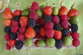 Berry skewers, strawberries, blackberries, raspberries, gooseberries, breakfast table, breakfast,