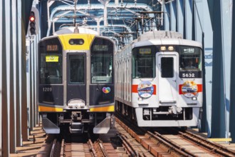 Regional trains of the private railway Hanshin Electric Railway in Osaka, Japan, Asia