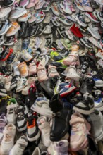 Lots of shoes, stall at the Osh Bazaar, Bishkek, Kyrgyzstan, Asia