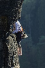 Climbers in Rathen in Saxon Switzerland