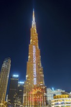 Night shot, illuminated advertising at the Burj Khalifa, Downtown, Dubai, United Arab Emirates,