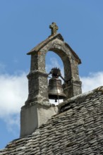 Bell tower of a church. Auvergne Volcanoes Park. Auvergne Rhone Alpes. France