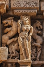 Famous erotic stone carving sculptures, Lakshmana Temple, Khajuraho, India. Unesco World Heritage