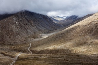 Himalayan landscape with road near Kunzum La pass, allegedly the highest motorable pass in the