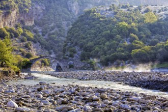 Kadiut bridge, arch bridge near Bënjë, Benja, over the wild river Lengarica, landscape near Bënjë