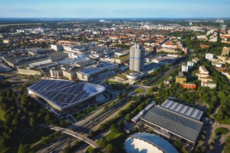 MUNICH, GERMANY, JULY 08, 2018: Aerial view of BMW Museum and BWM Welt and factory and Munich from