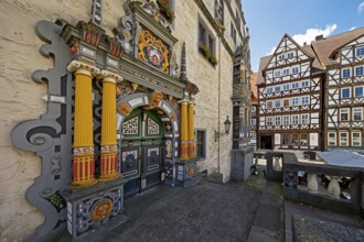 Main portal with colourful wood carving on Münden Town Hall, Weser Renaissance, Hann. Münden or