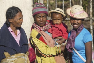 Close up portrait of Malagasy women with toddler, Madagascar, Southeast Africa, Africa