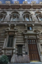 Detailed view of the courtyard façade of the Palazzo della Borsa, built between 1907 and 1912, in