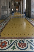 Floor mosaic in the arcade of the Palazzo della Borsa, built between 1907 and 1912, in Piazza de