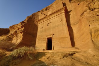 Nabataean tomb at Djabal Al-Ahmar in first daylight, Hegra or Mada'in Salih, AlUla region, Medina