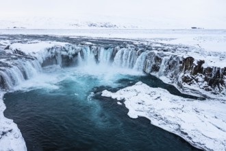 Godafoss waterfall, snowy landscape, drone shot, Northern Iceland Eyestra, Iceland, Europe