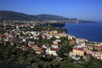 View over the bay of Penisola Sorrentina with the towns of Meta (front) and Sorrento, Campania,