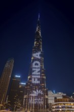 Night shot, illuminated advertising at the Burj Khalifa, Downtown, Dubai, United Arab Emirates,