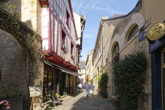 Houses in the narrow cobbled alley Rue des Halles in the old town of Vannes, Brittany. Vannes,