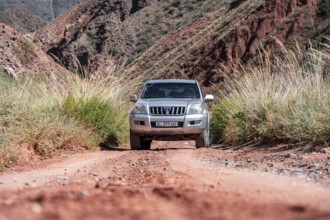 Toyota Landcruiser, off-road trip on unpaved road in a canyon, Chuy Province, Kyrgyzstan, Asia