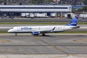 A JetBlue Embraer 190 aircraft with the registration number N334JB at New York JFK Airport in New