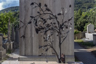 Metal sculpture on a grave, Monumental Cemetery, Cimitero monumentale di Staglieno), Genoa, Italy,