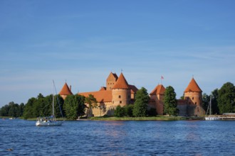 Trakai Island Castle in lake Galve with boats in summer day, Lithuania. Trakai Castle is one of