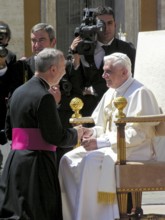 Pope Benedict XVI Joseph Ratzinger welcomes a bishop to the 1st audience on 27. 04. 2005, St.