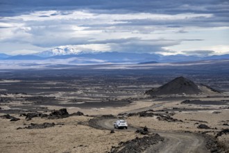 Car on a dirt road, volcanic landscape, barren landscape, Vatnajökull National Park, Icelandic