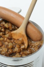 Lentil (Lens culinaris) dish and sausages in tin, lentil