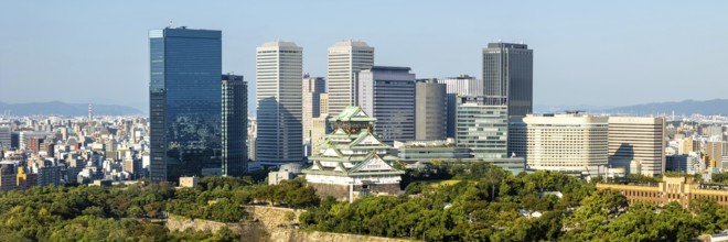 Osaka Castle Castle from above with the skyline skyscrapers panorama in Osaka, Japan, Asia