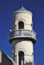 Mosque tower at Bab Kabir city gate in Muscat, Oman, Asia