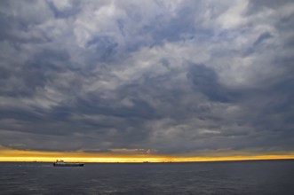 Cargo ship on the English Channel in the North Sea off Rotterdam, Netherlands