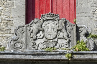 Coat of arms in stone above the entrance gate of 12th century Ecaussinnes-Lalaing Castle, Château