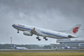 MINSK, BELARUS, JUNE 15, 2018: Air China flight Airbus A330-200 plane taking off on runway in