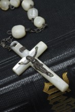 Rosary on bible, cross, crucifix, rosary chain