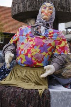 Witch figures at the fountain, decoration for Walpurgis Night, Braunlage, Harz, Lower Saxony,